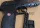 A tras cu pistolul în centrul oraşului
