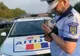Pisică salvată de polițiști de sub roțile autoturismelor aflate în traficul din Iași