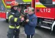 Pisică rămasă blocată la 12 metri înălţime, într-un brad. A fost solicitată intervenția pompierilor